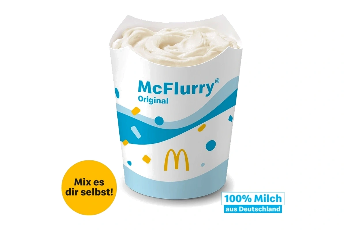 McDonald's McFlurry with OREO Cookies in a four-flap cup showing creamy vanilla soft serve blended with crunchy OREO cookie pieces